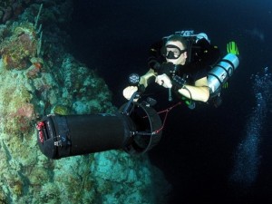 The author, with the 25W LED scuba dive light from Titan Dive Gear